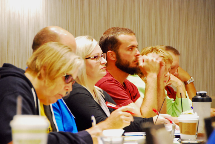 Attendees focused during a Street Smart training session