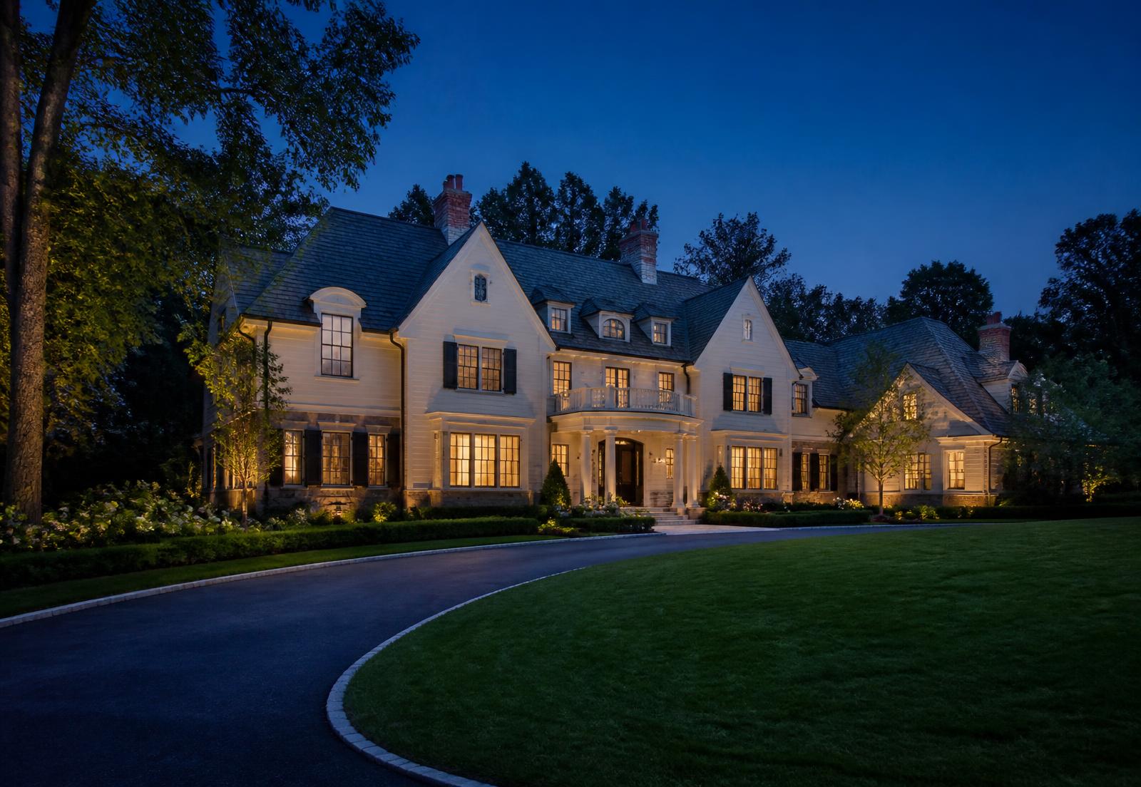 An established estate home at dusk